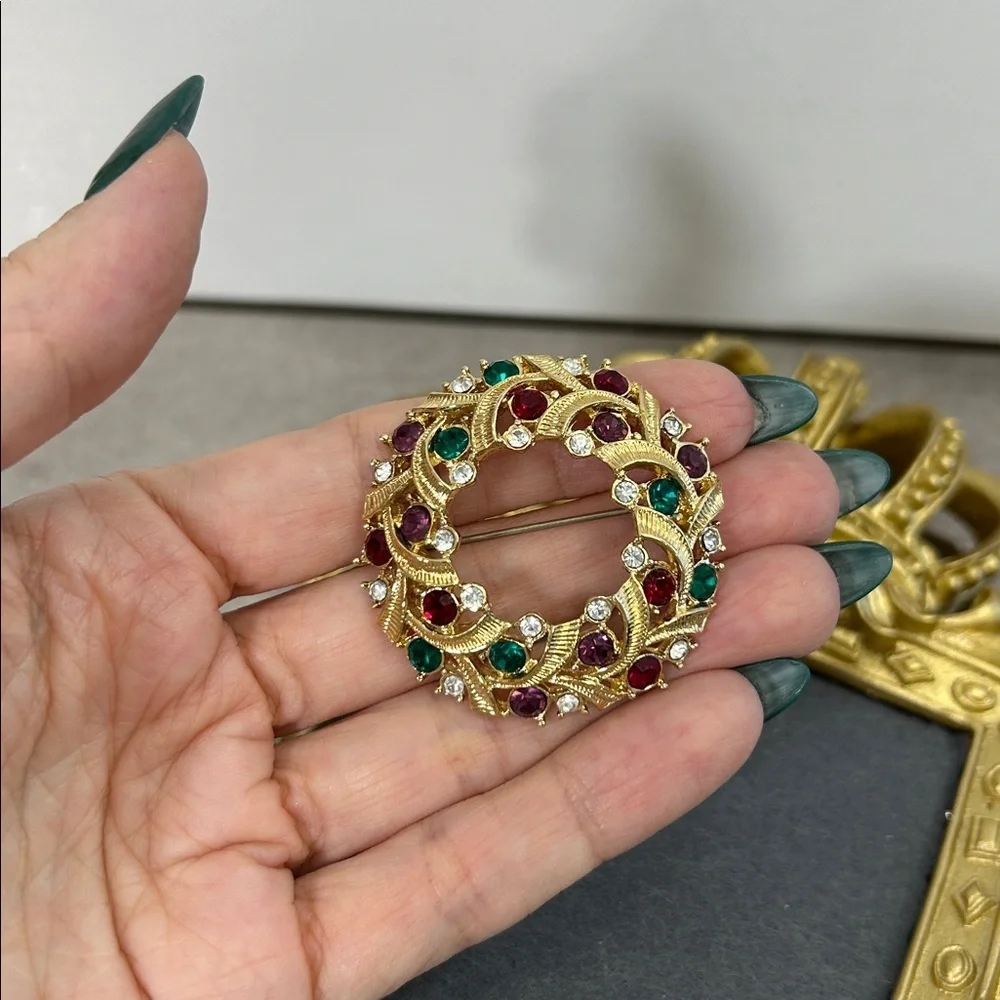 Elegant Gold and Jewel-Toned Brooch